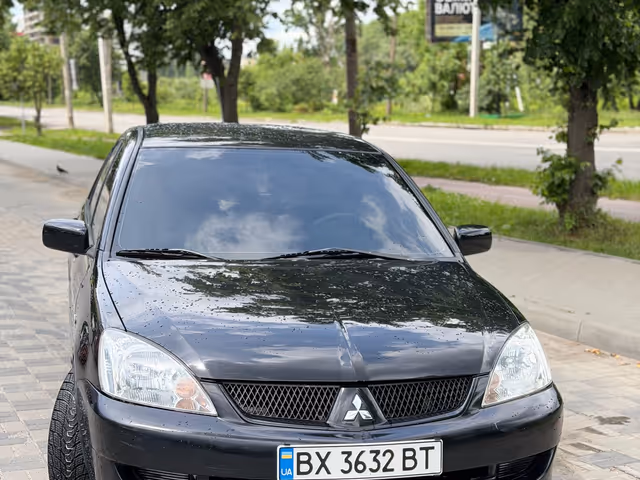 Mitsubishi Lancer - фото 1