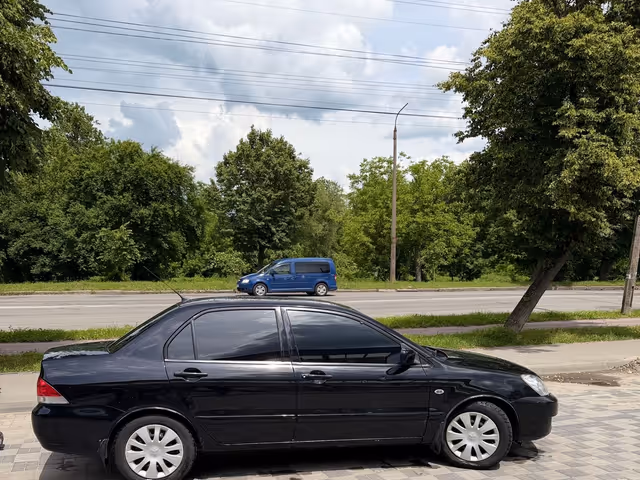 Mitsubishi Lancer - фото 2