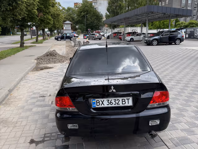 Mitsubishi Lancer - фото 3