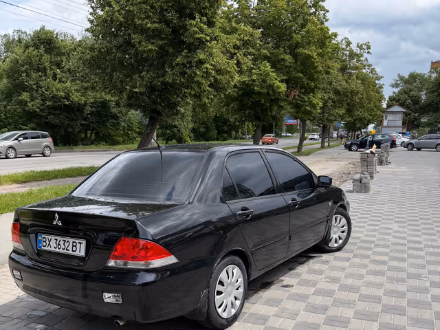 Mitsubishi Lancer - фото 4