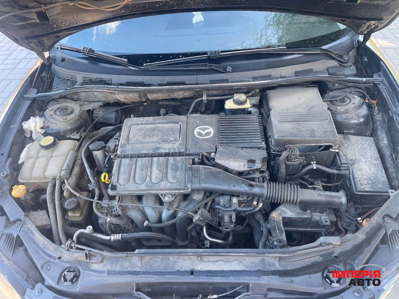 Mazda 3 - фото 8