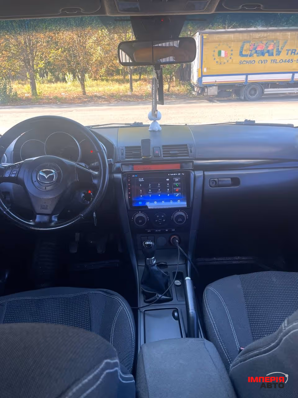 Mazda 3 - фото 7