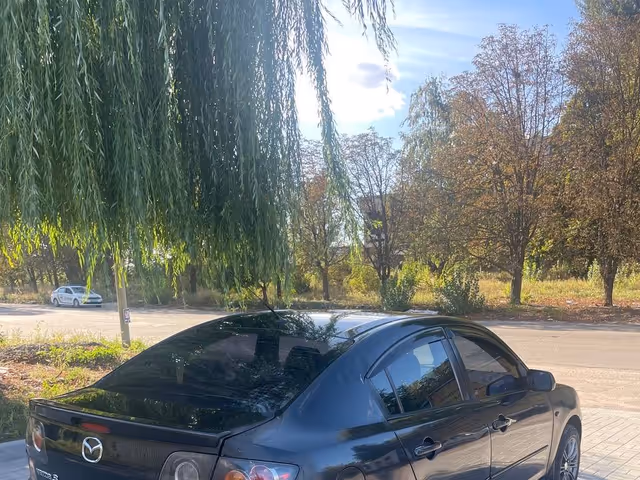 Mazda 3 - фото 4