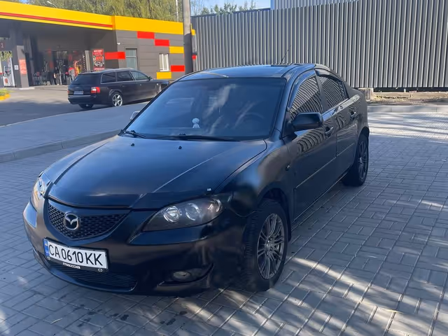 Mazda 3 - фото 5