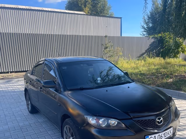 Mazda 3 - фото 1