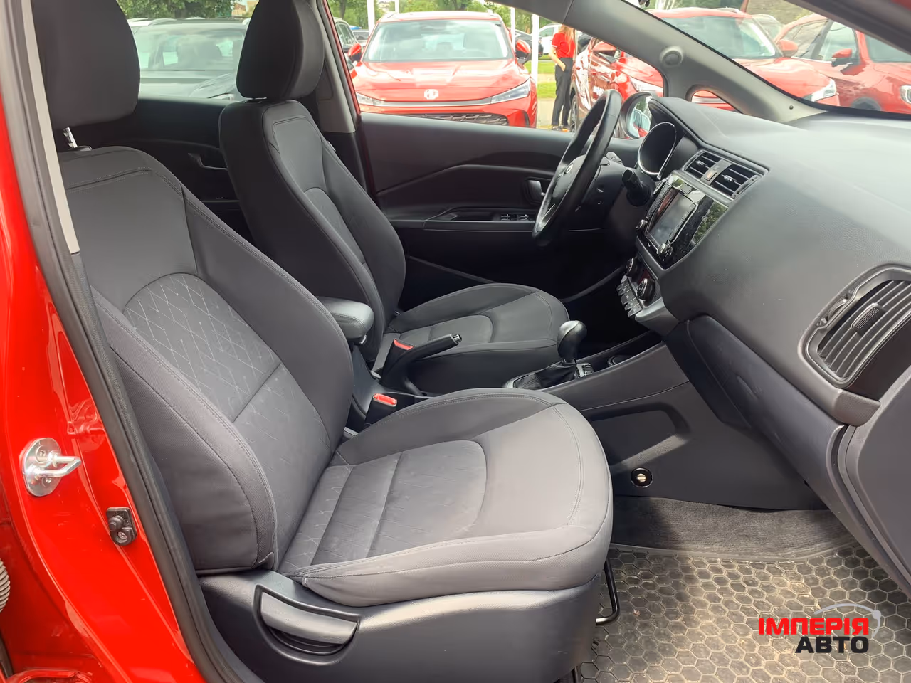 Kia Rio - фото 12