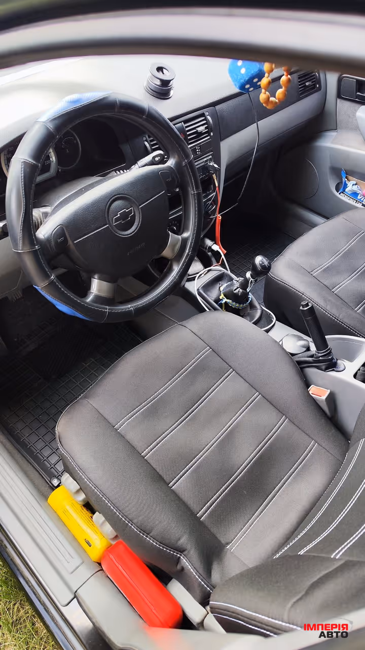 Chevrolet Lacetti - фото 11