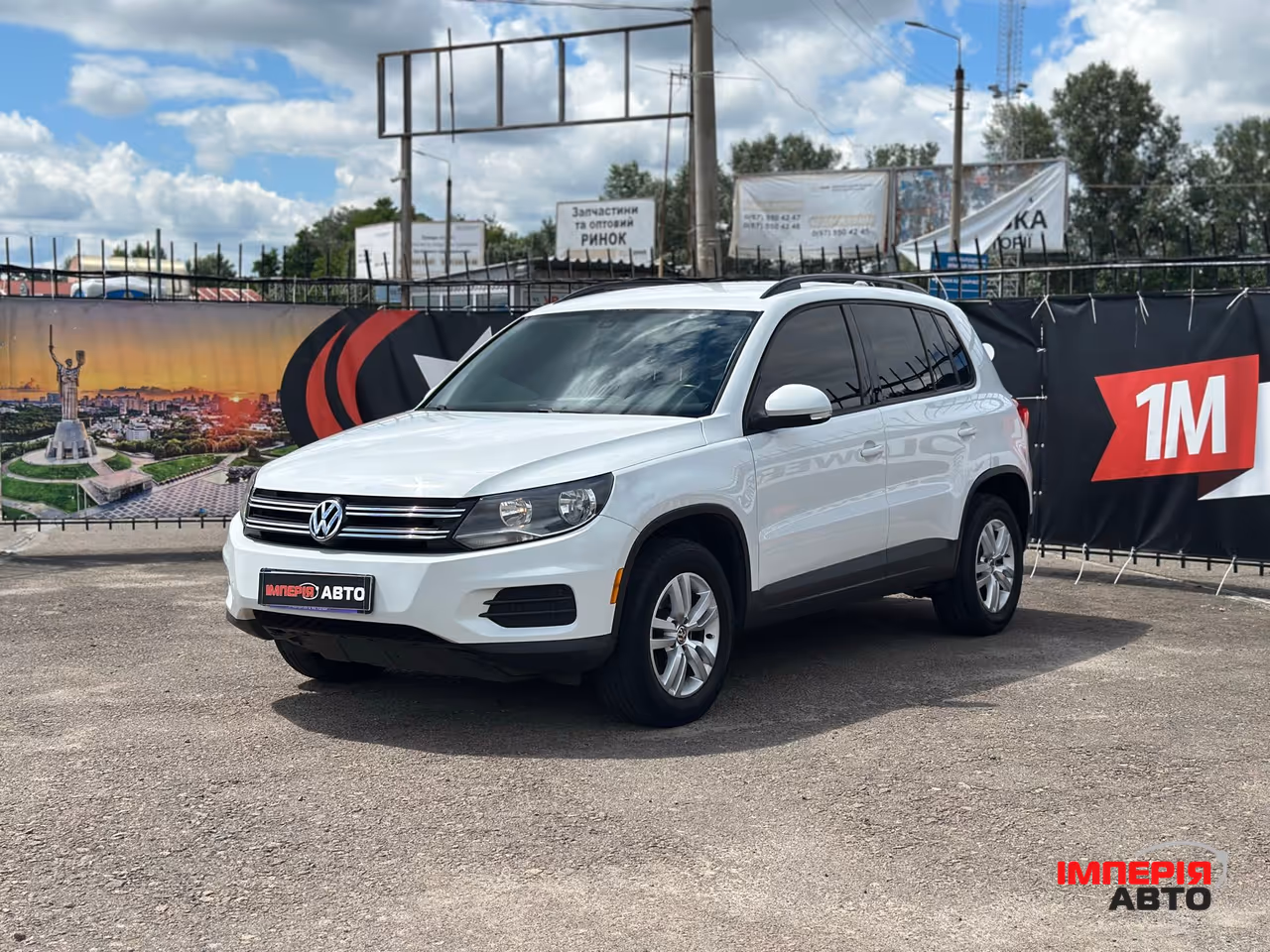 Volkswagen Tiguan - фото 1