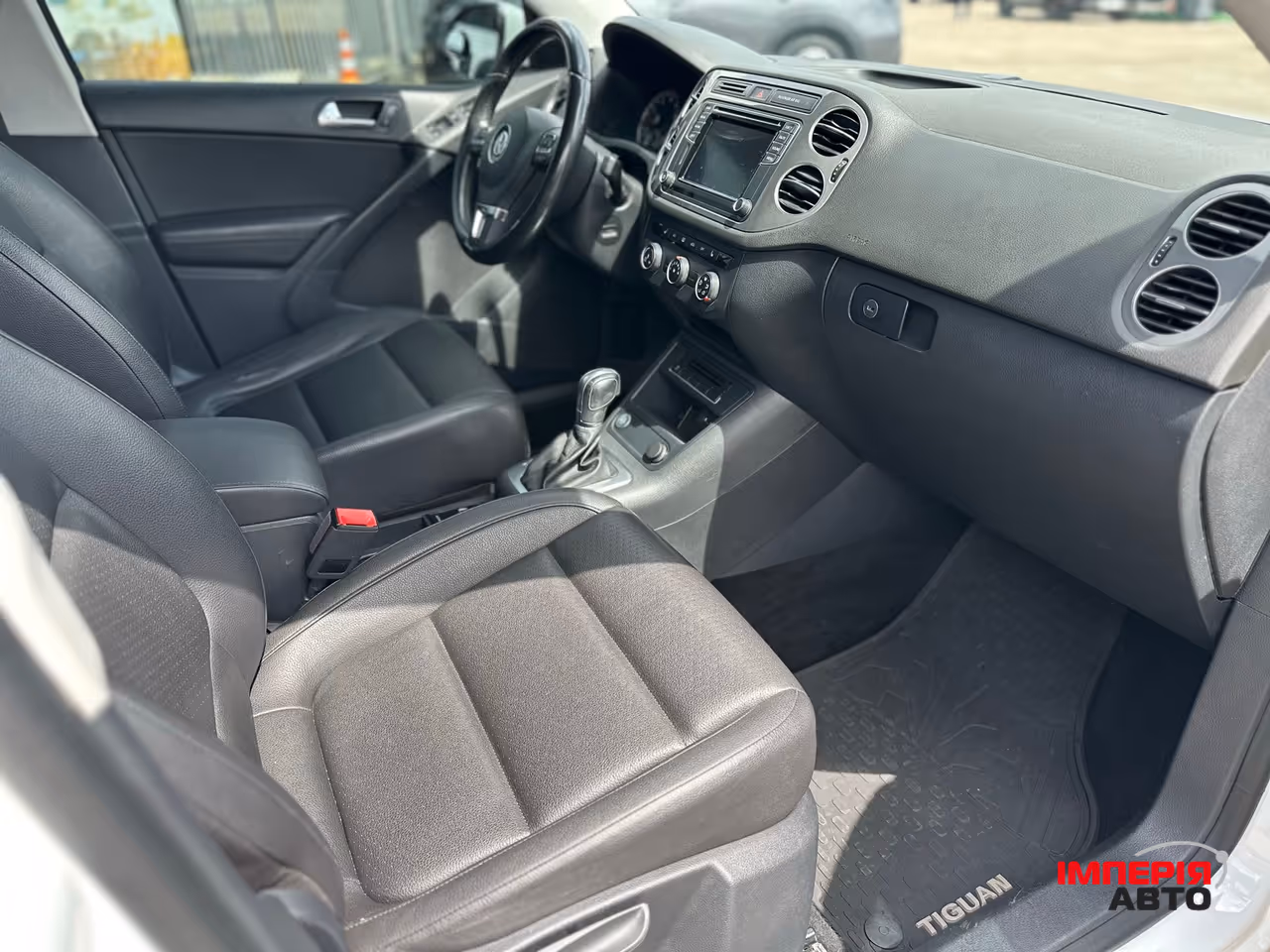 Volkswagen Tiguan - фото 10