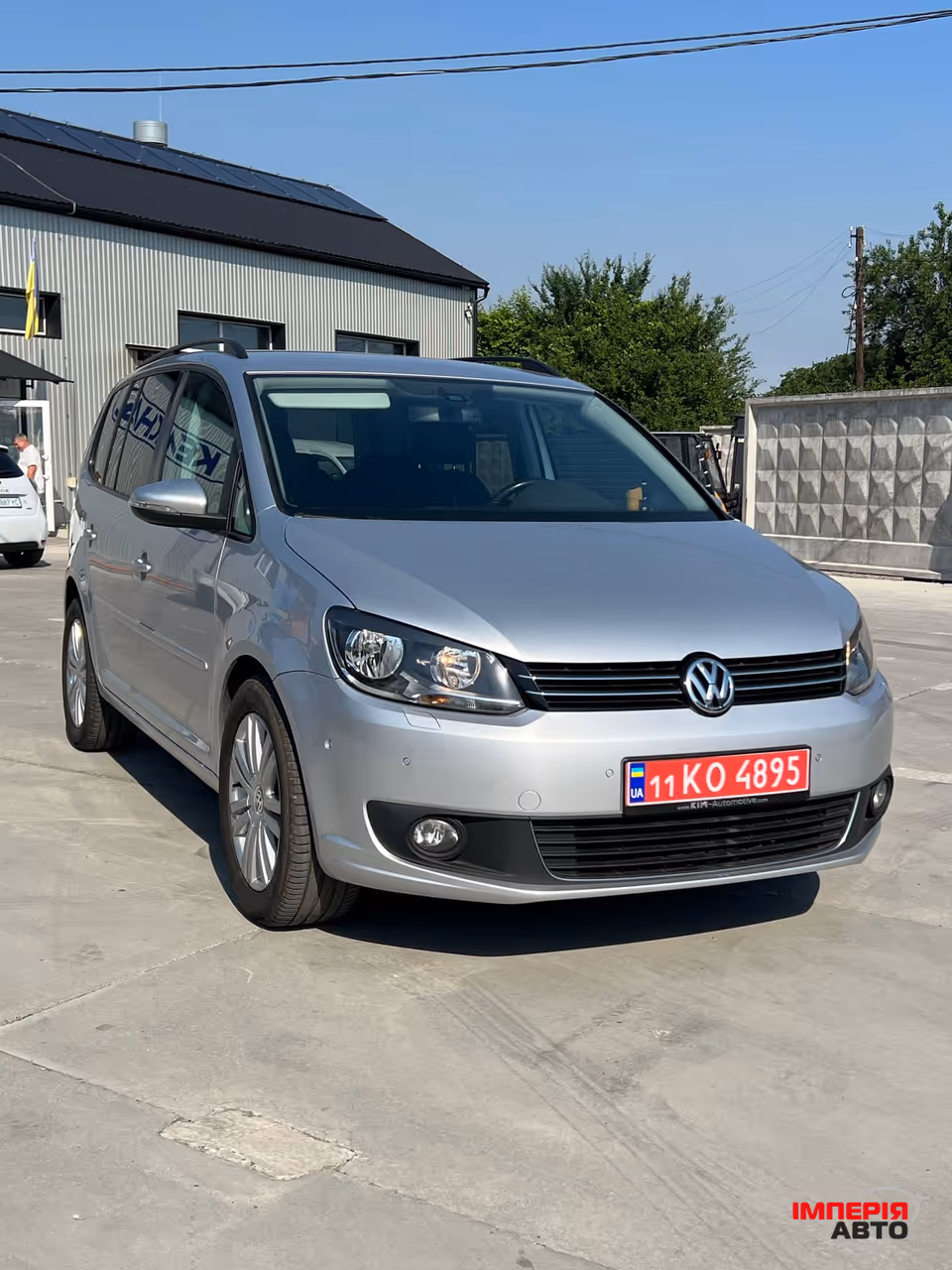 Volkswagen Touran - фото 8