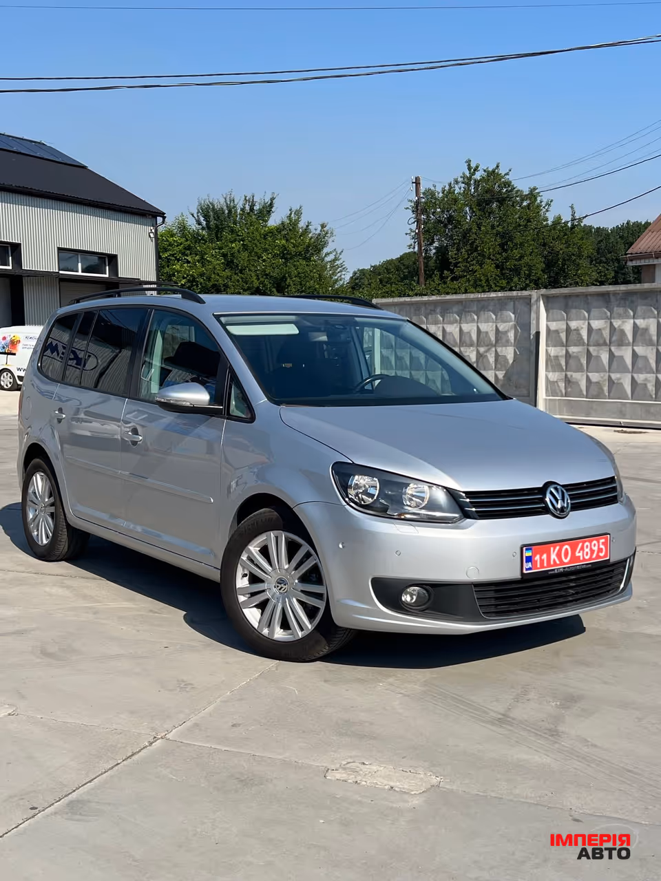 Volkswagen Touran - фото 1