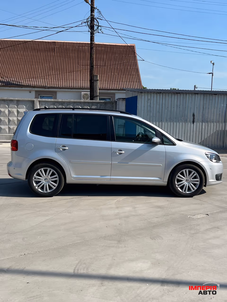 Volkswagen Touran - фото 12
