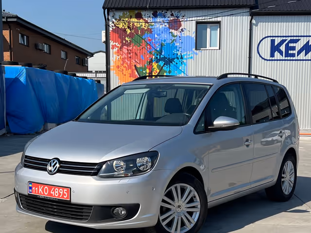 Volkswagen Touran - фото 2