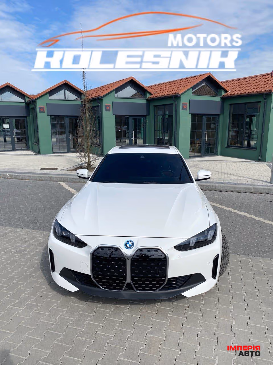 BMW i4 - фото 1