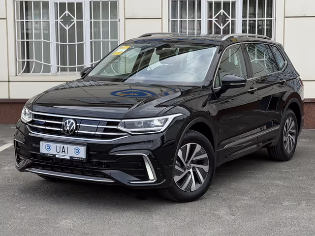 Volkswagen Tiguan - фото 1