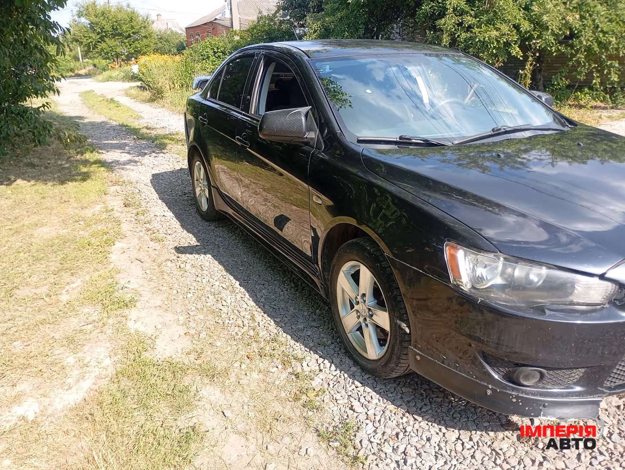 Mitsubishi Lancer - фото 8