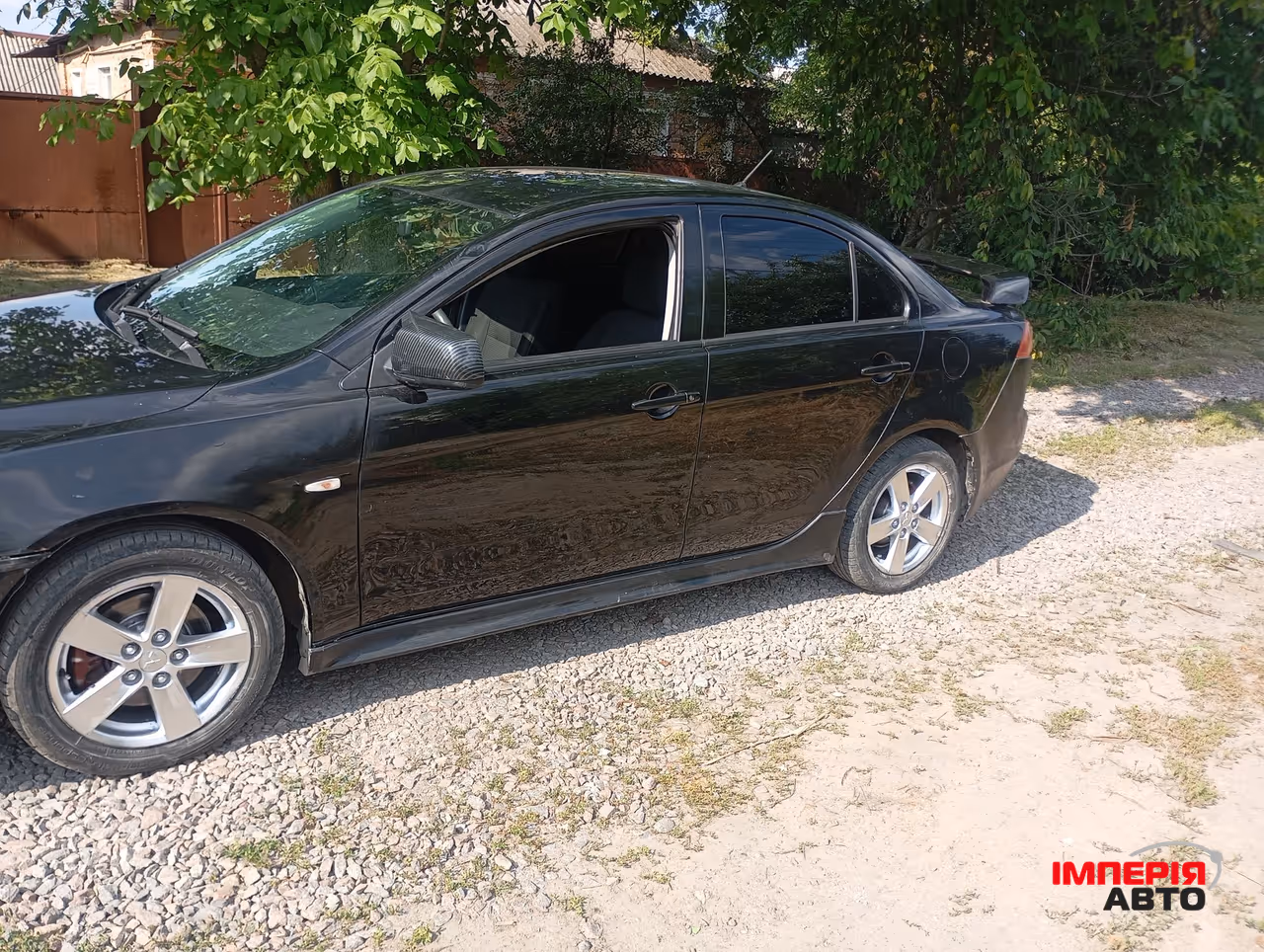 Mitsubishi Lancer - фото 1