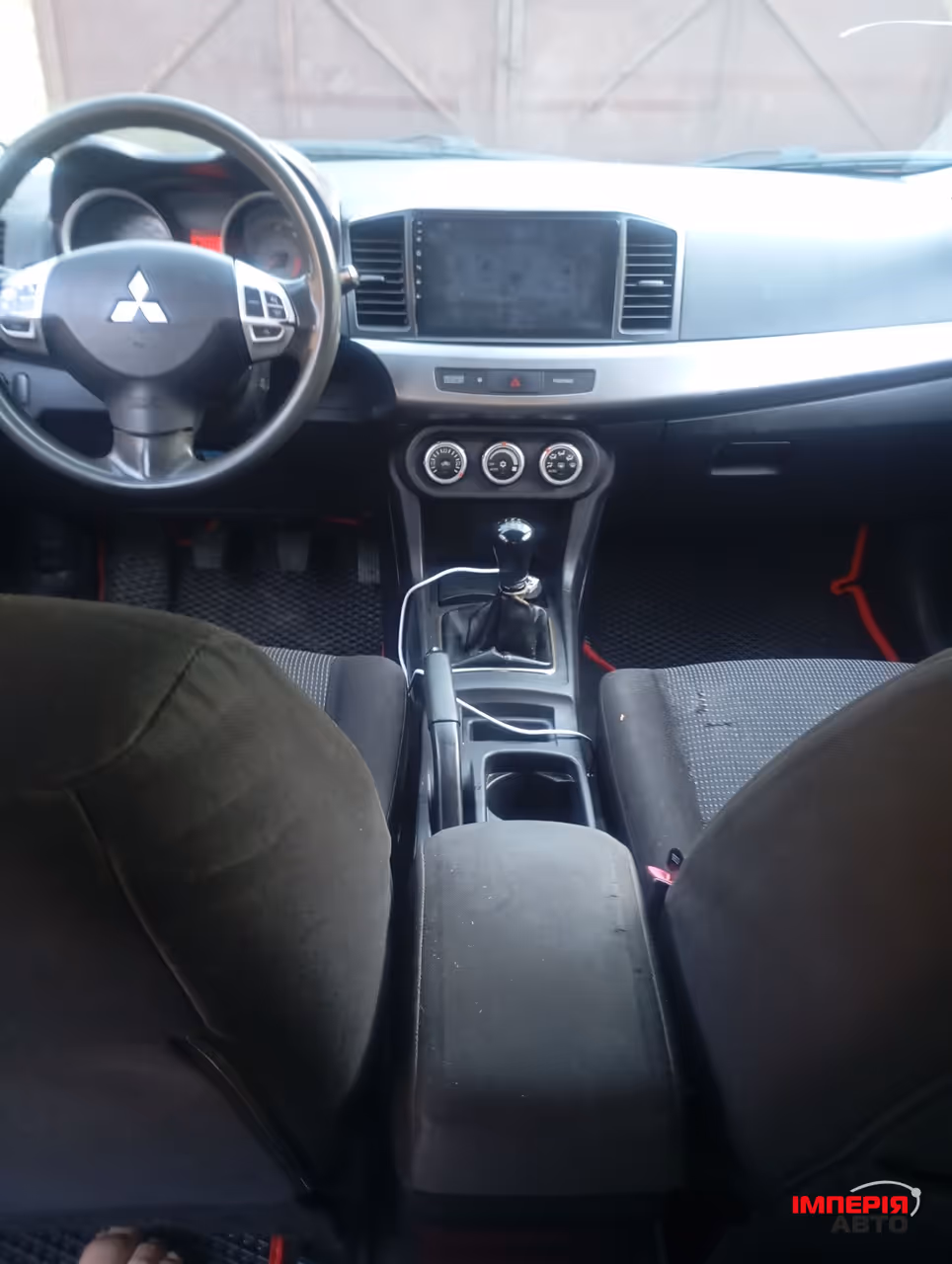 Mitsubishi Lancer - фото 7