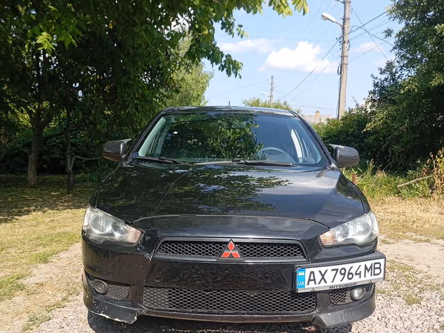 Mitsubishi Lancer - фото 3