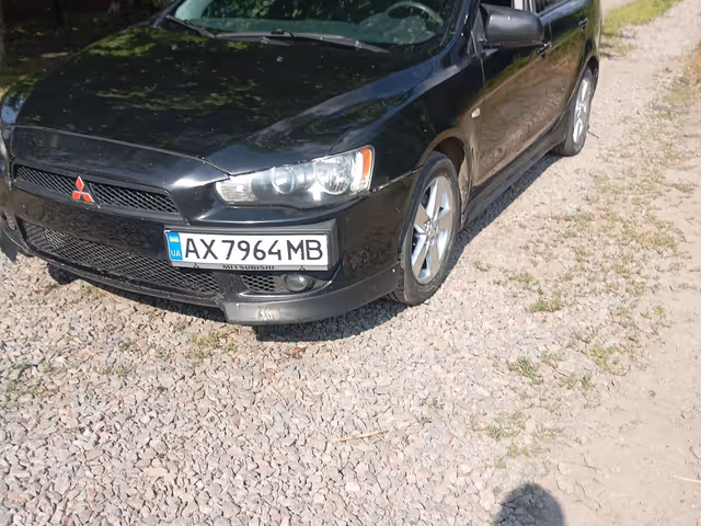 Mitsubishi Lancer - фото 2