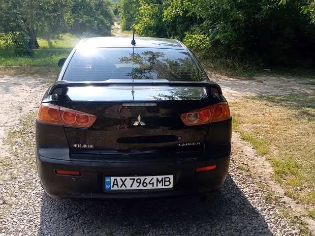 Mitsubishi Lancer - фото 5