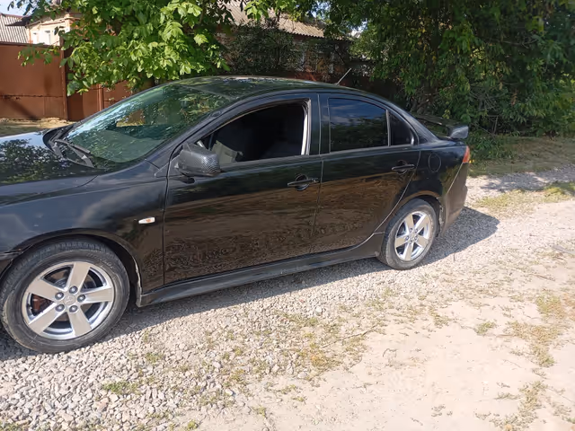 Mitsubishi Lancer - фото 1