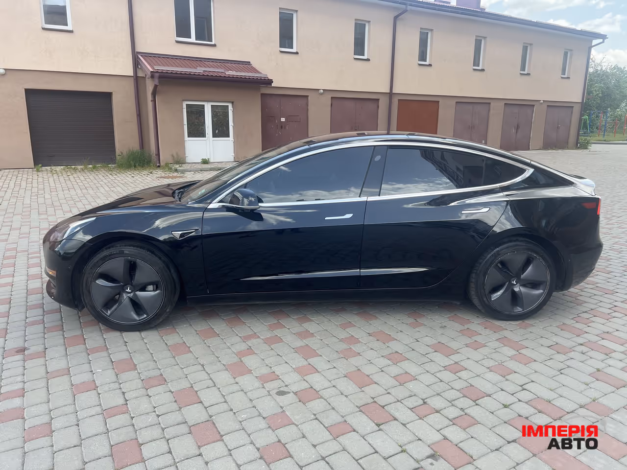 Tesla Model 3 - фото 12