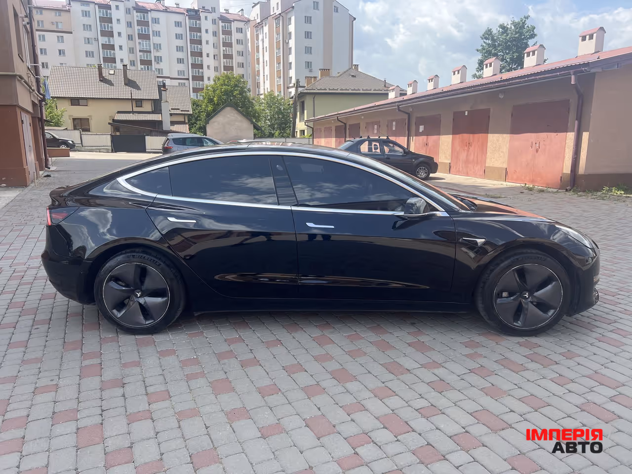Tesla Model 3 - фото 10