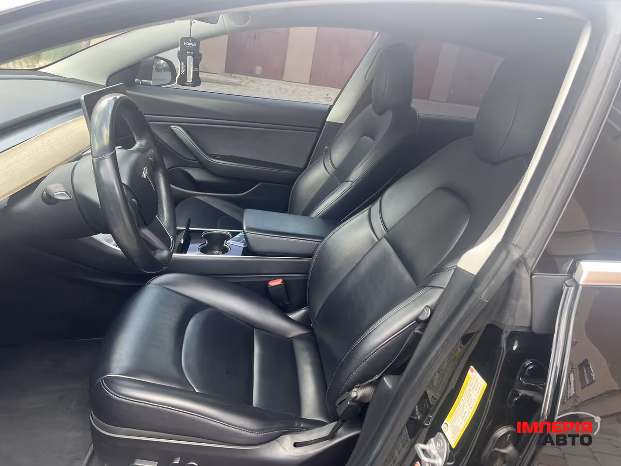 Tesla Model 3 - фото 28