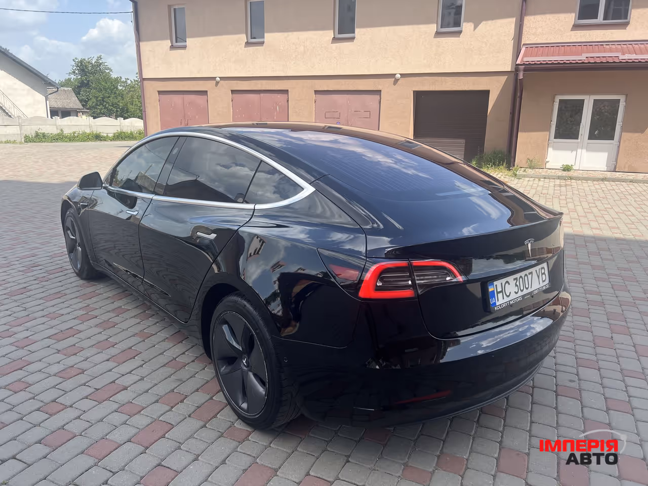 Tesla Model 3 - фото 24