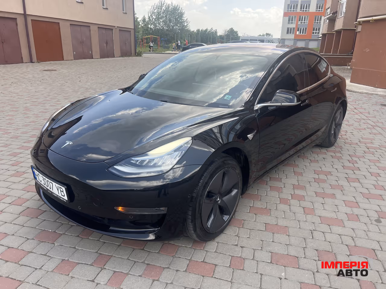 Tesla Model 3 - фото 1