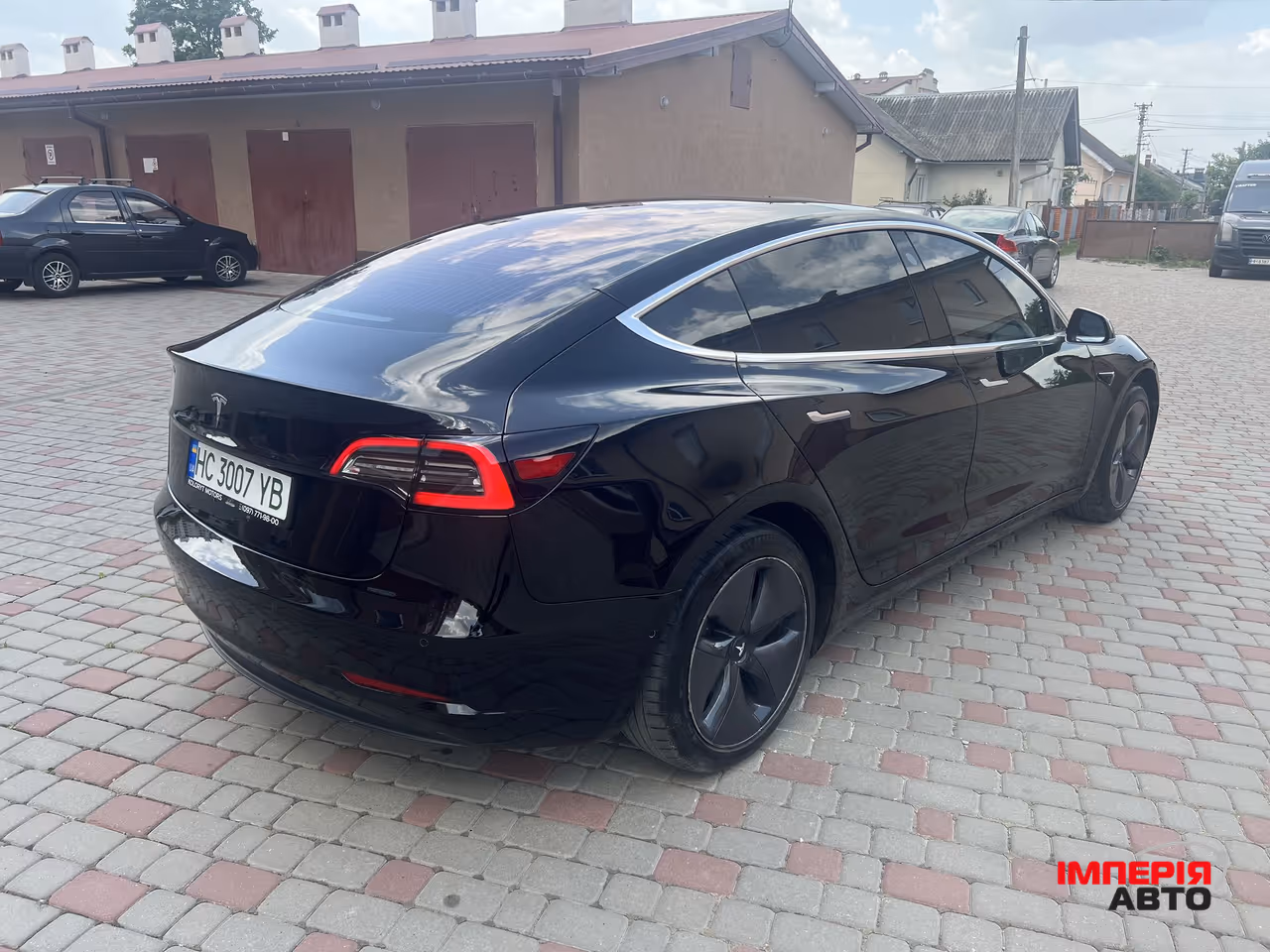 Tesla Model 3 - фото 17