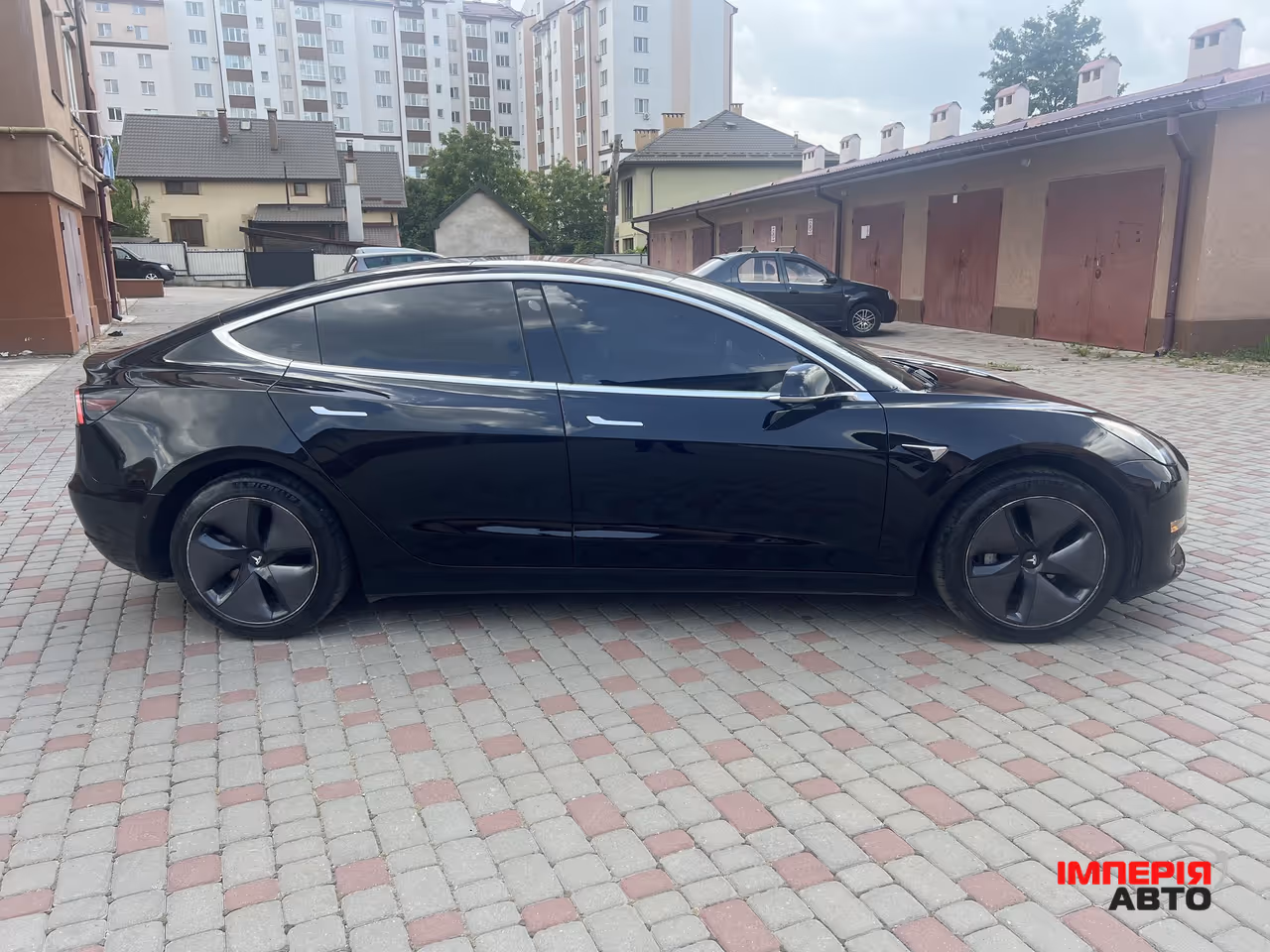Tesla Model 3 - фото 14