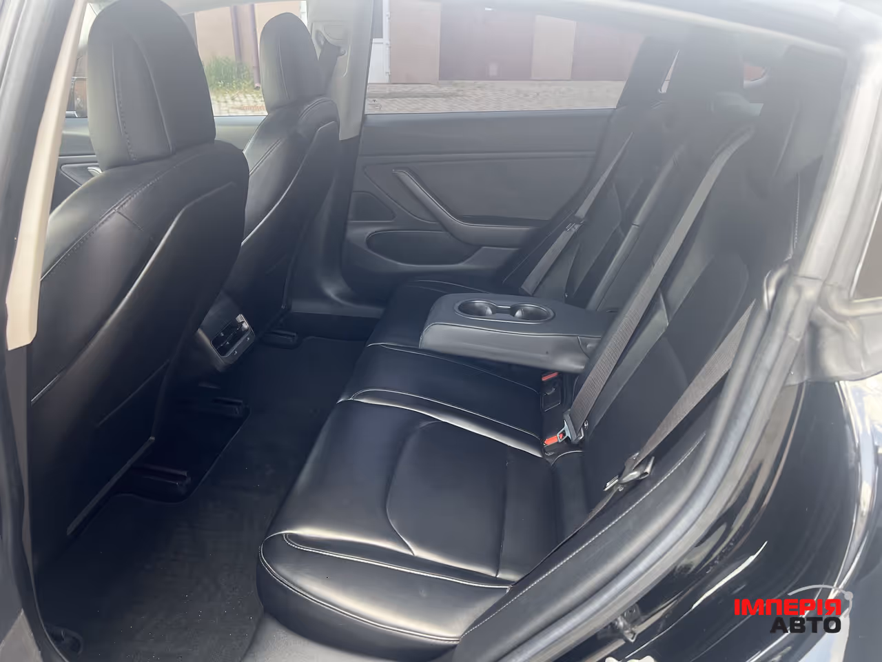 Tesla Model 3 - фото 29