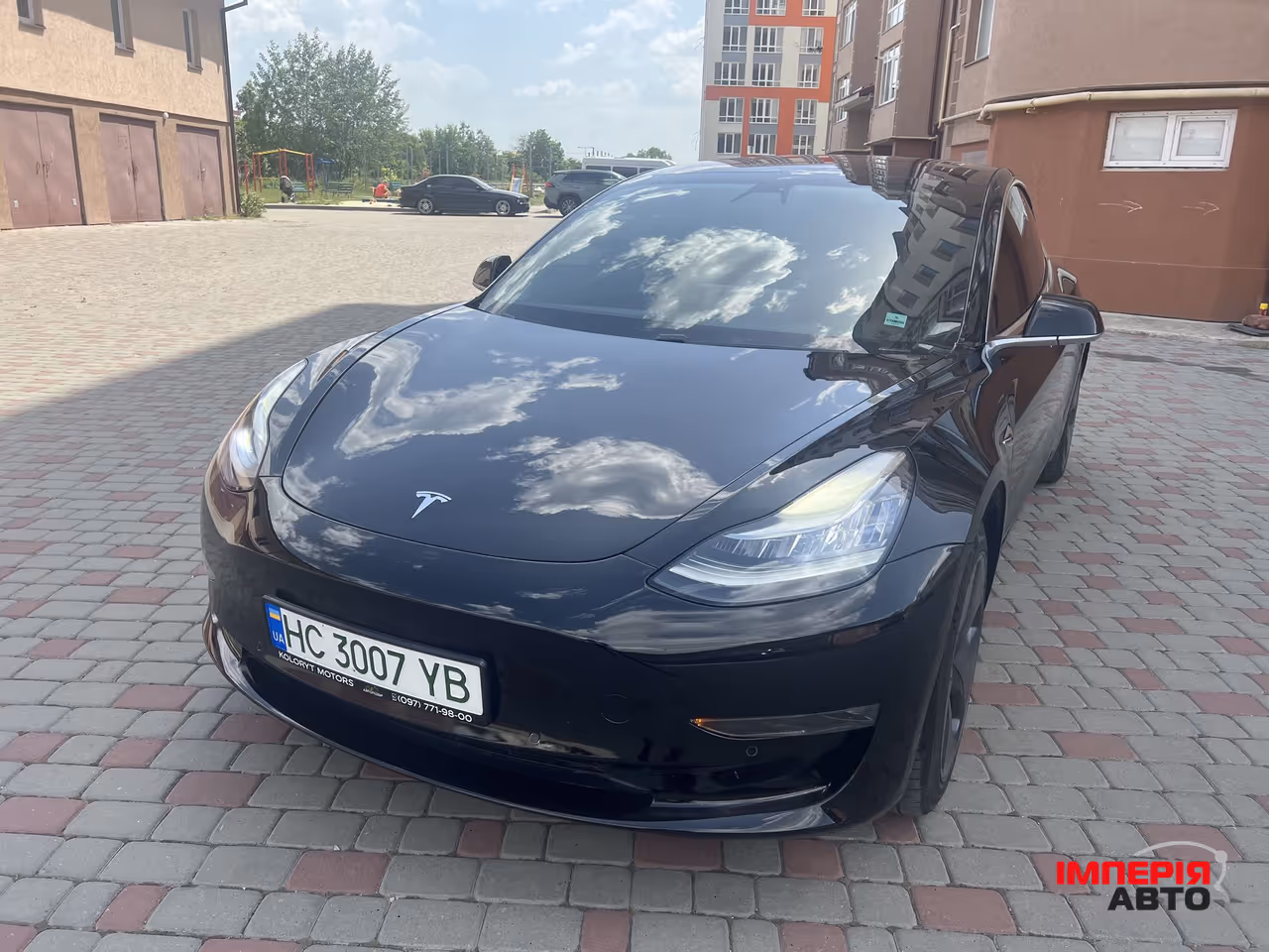Tesla Model 3 - фото 11