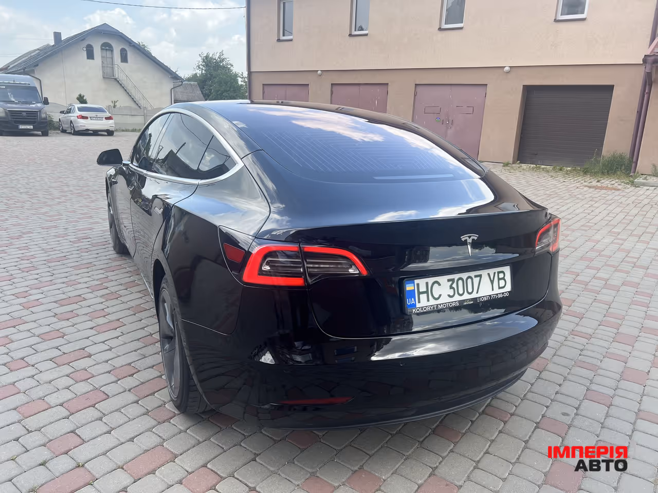 Tesla Model 3 - фото 15