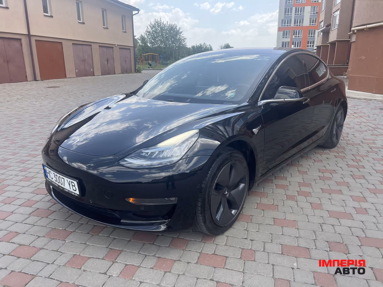 Tesla Model 3 - фото 6