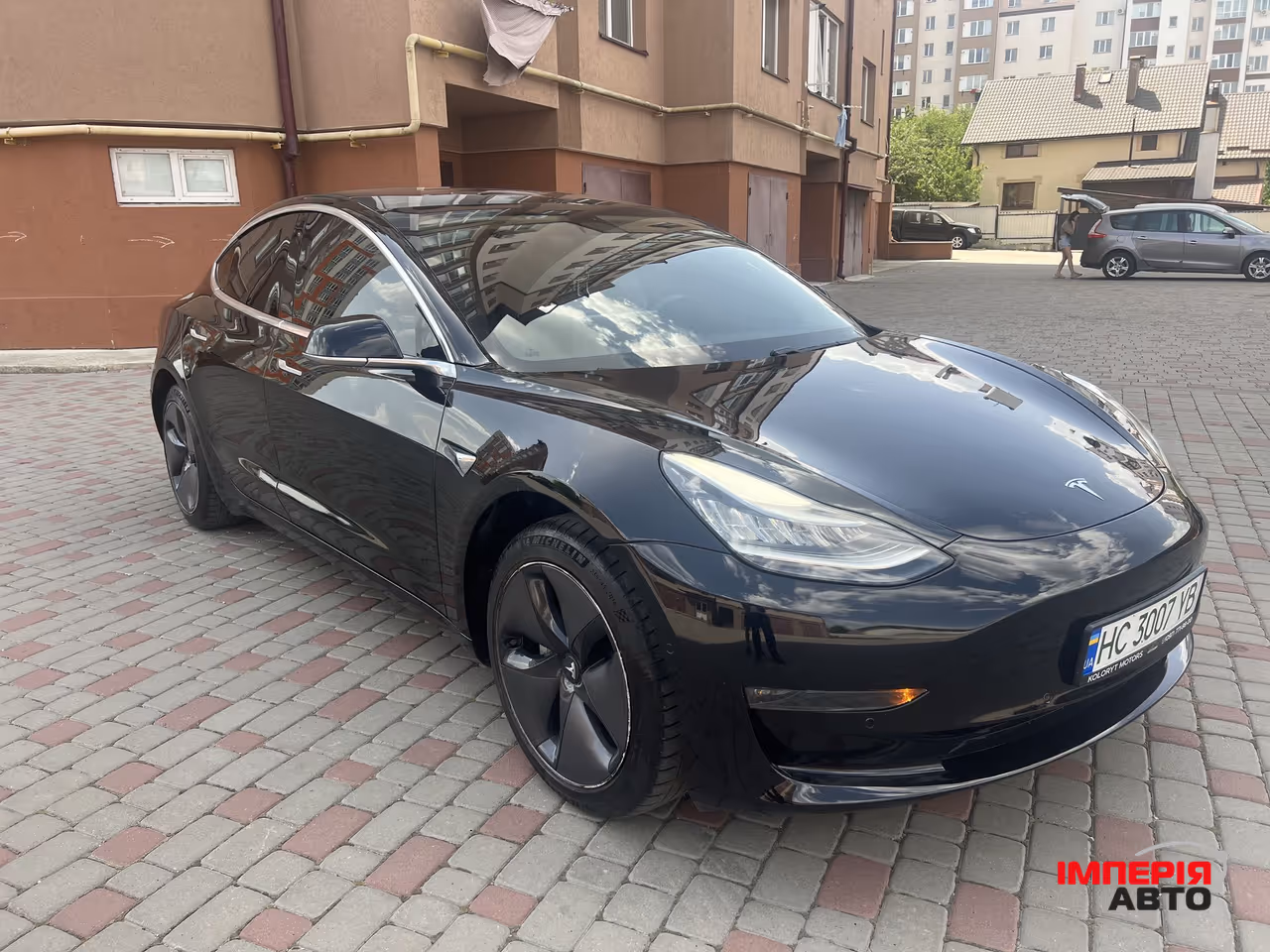 Tesla Model 3 - фото 8