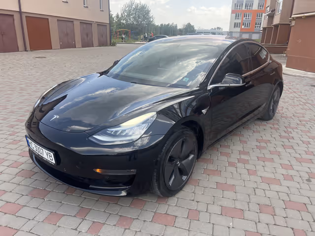 Tesla Model 3 - фото 1