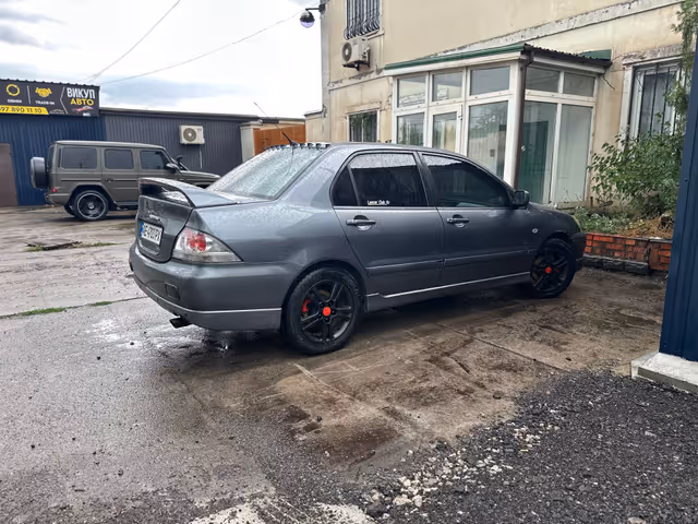 Mitsubishi Lancer - фото 5