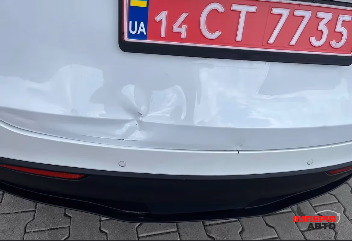 Tesla Model Y - фото 9
