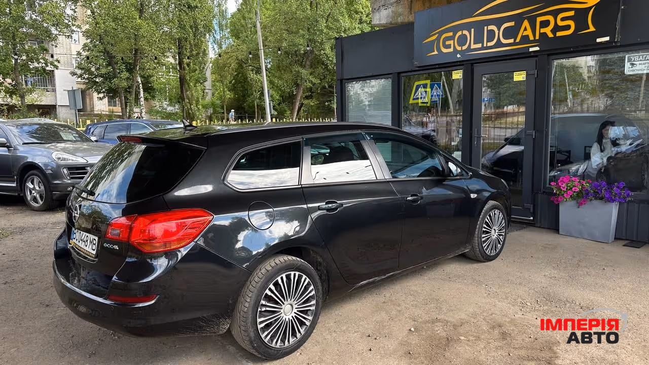 Opel Astra - фото 7