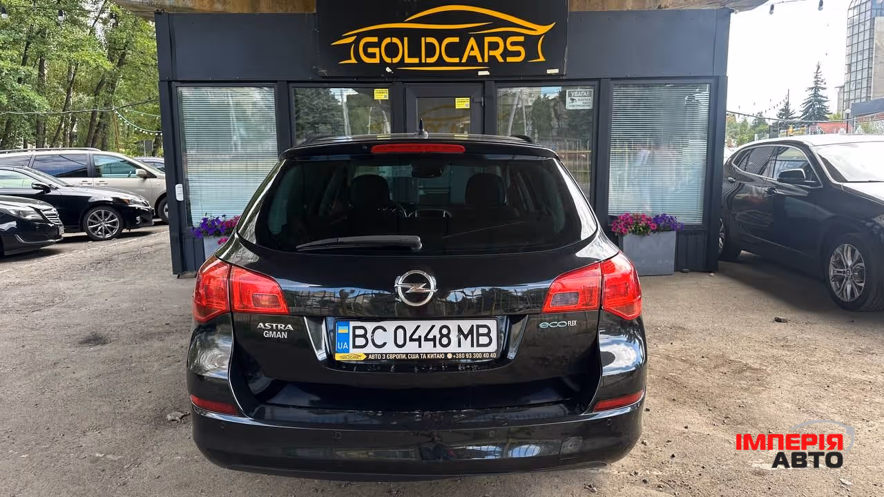 Opel Astra - фото 4