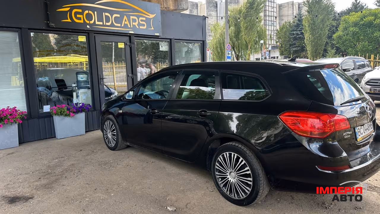 Opel Astra - фото 6