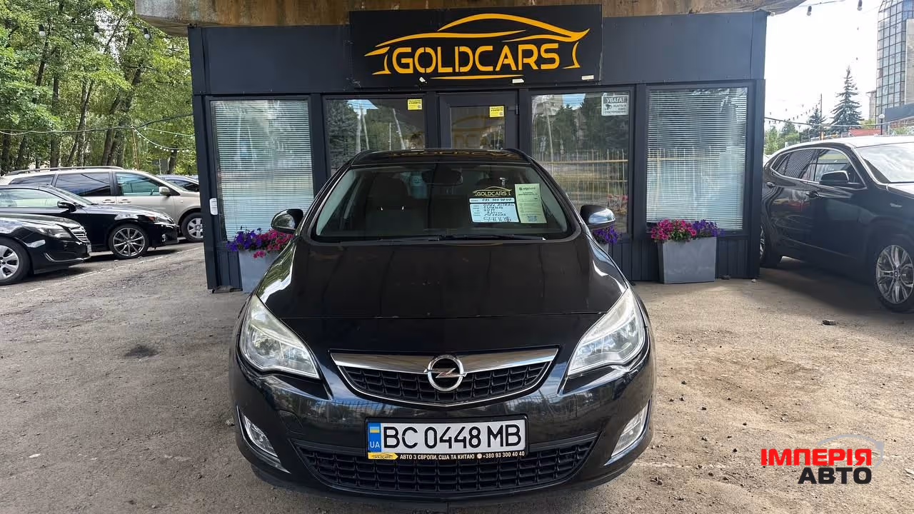 Opel Astra - фото 1