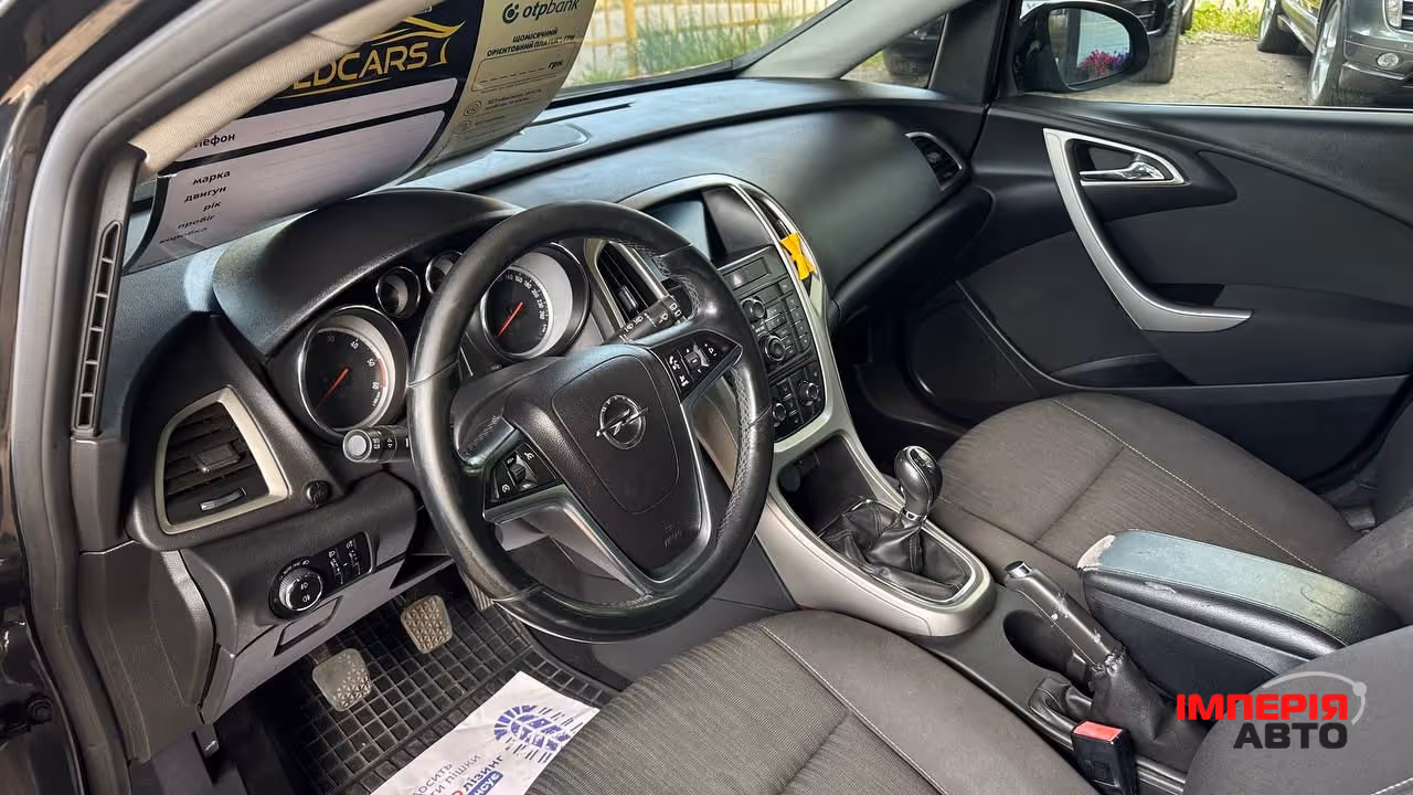Opel Astra - фото 5