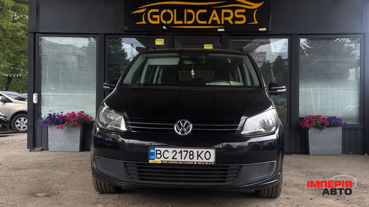 Volkswagen Touran - фото 1