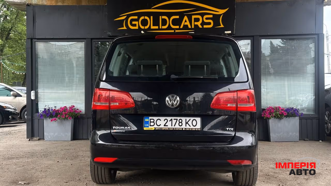 Volkswagen Touran - фото 6