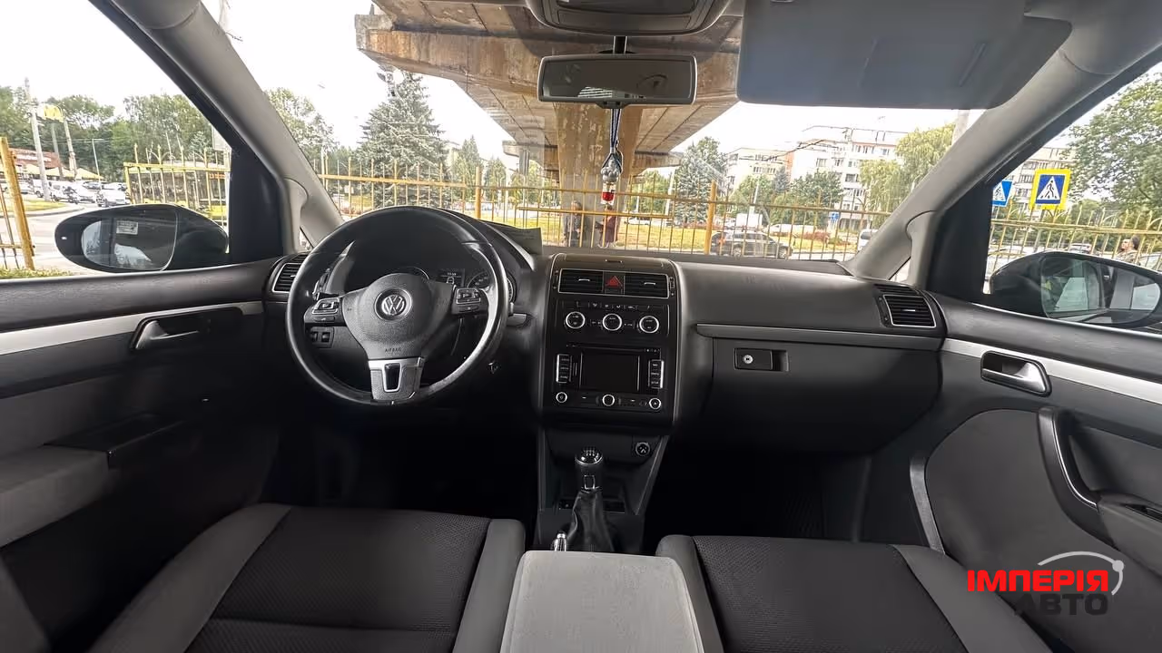 Volkswagen Touran - фото 5