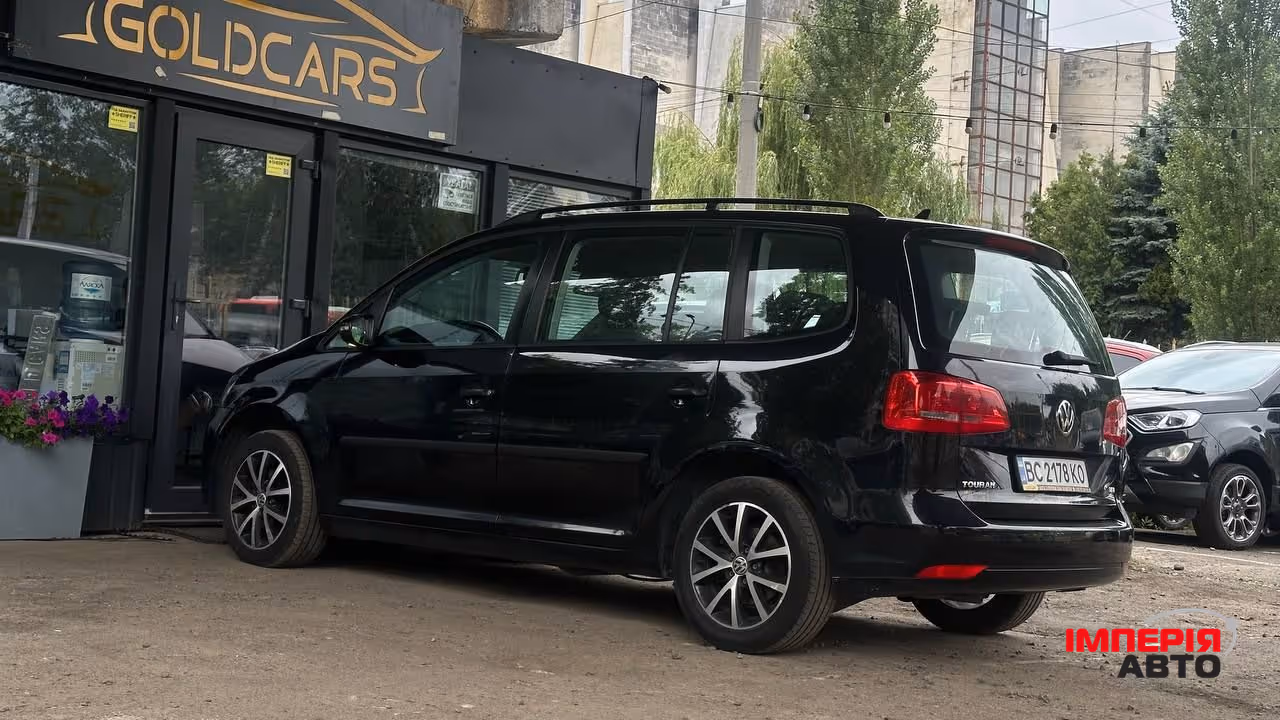 Volkswagen Touran - фото 3